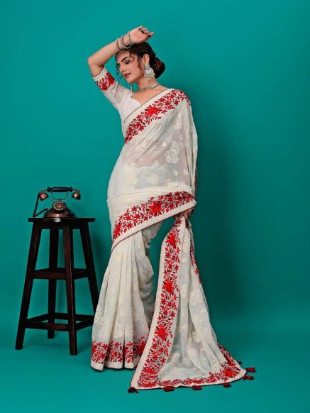 Elegant Women Border Saree in Georgette with Modern Traditional Designs - Ideal for Weddings Parties and Festivals Manufacturers  in Delhi